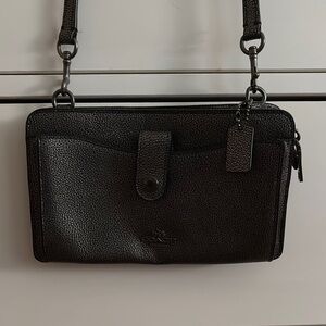 Coach Black Messenger Bag with Adjustable Straps and Textured Finish